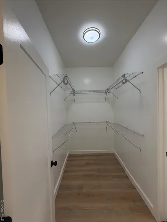 a view of a room with racks on the wall