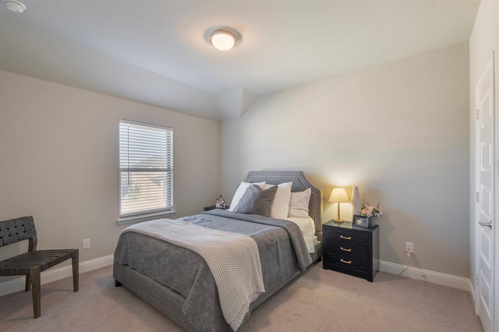 16650 Nightshade Road Frisco, TX 75033 - Photo 28 of 40 a bedroom with a bed and a window