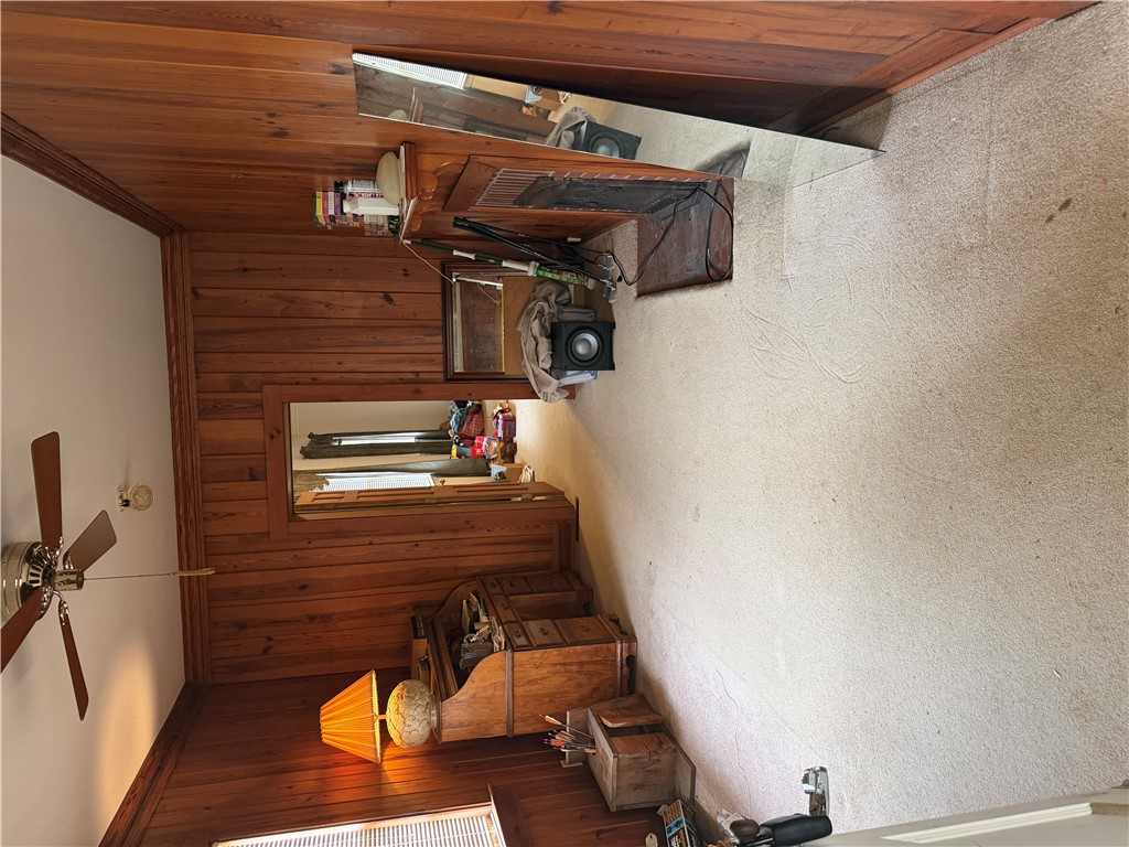 715 Concord Road Anderson, SC 29621 - Photo 18 of 24 Rich wood paneling provides a rustic, inviting atmosphere. One Door leads to Master Bedroom & other to the Hallway.