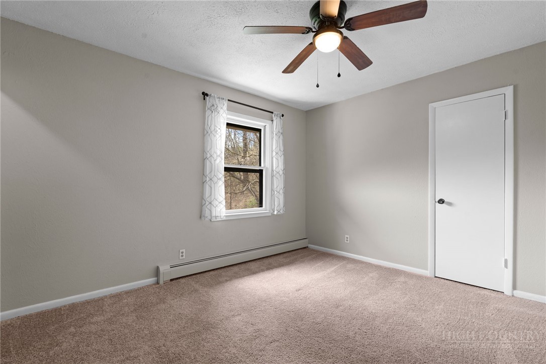 2345 Watauga River Road Sugar Grove, NC 28679 - Photo 17 of 50 a view of an empty room with a window