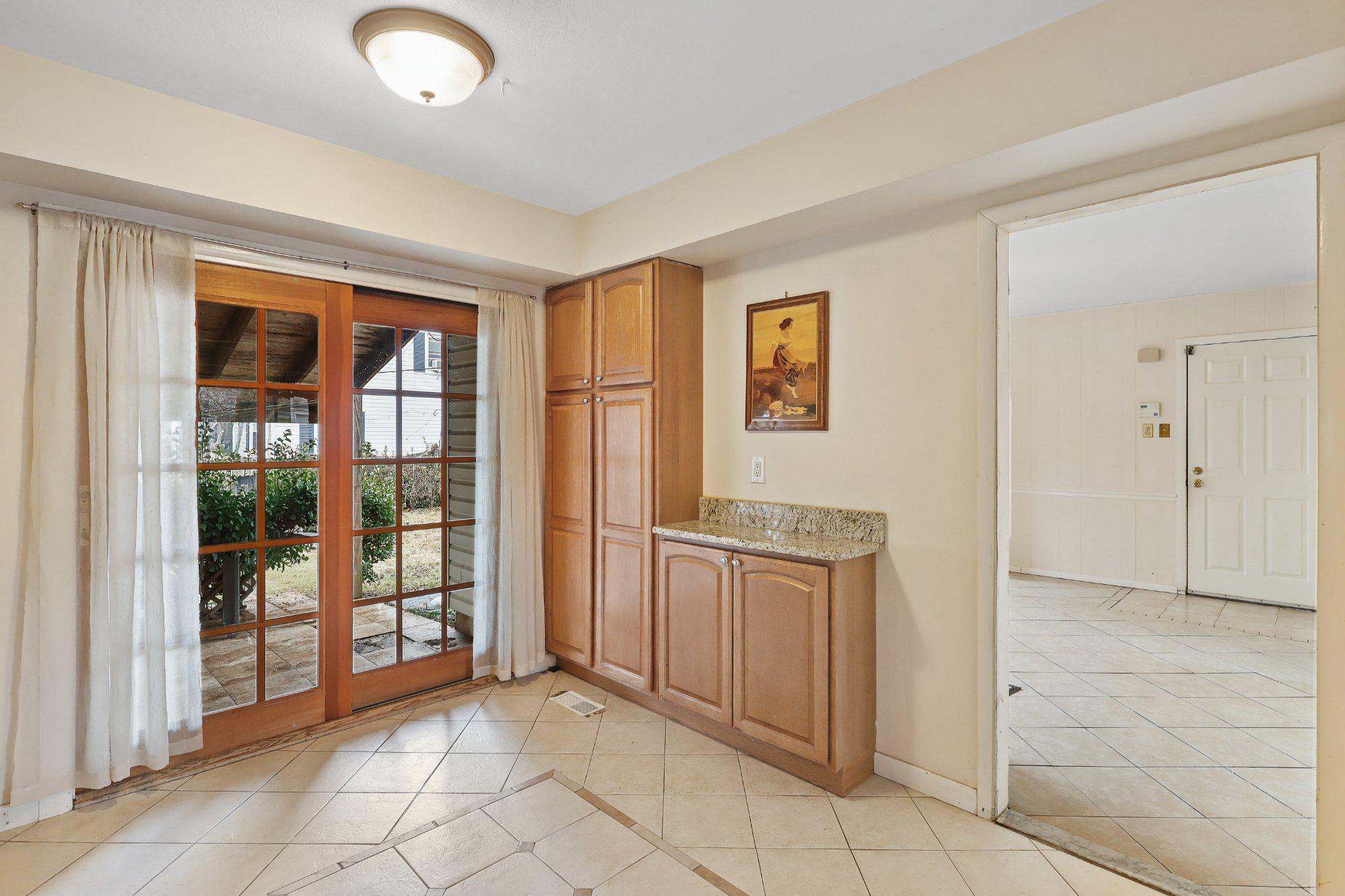 4228 Pageant Lane Fairfax, VA 22033 - Photo 12 of 33 a view of a kitchen with an entryway and an empty room
