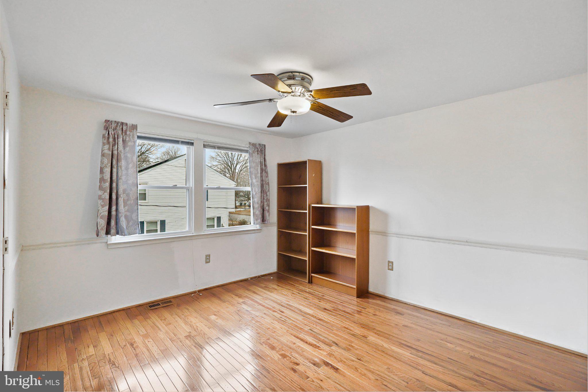 4228 Pageant Lane Fairfax, VA 22033 - Photo 15 of 33 a view of empty room with wooden floor and fan