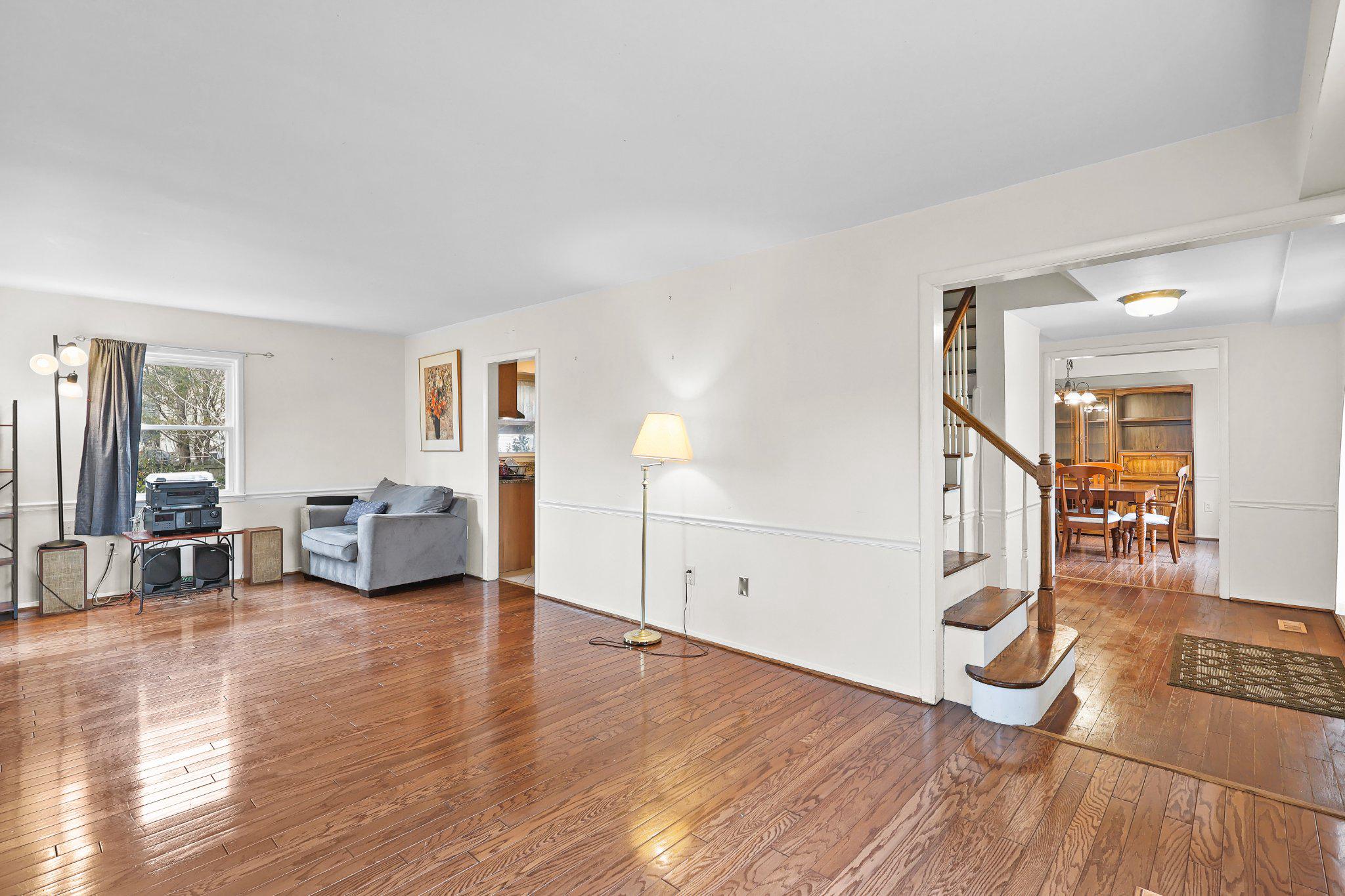 4228 Pageant Lane Fairfax, VA 22033 - Photo 2 of 33 a living room with furniture and a wooden floor