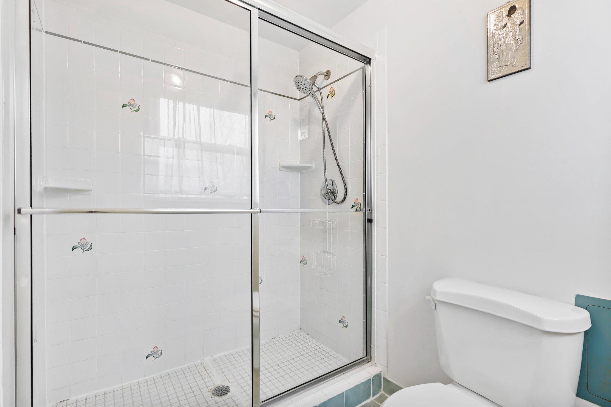 4228 Pageant Lane Fairfax, VA 22033 - Photo 23 of 33 a bathroom with a shower and toilet