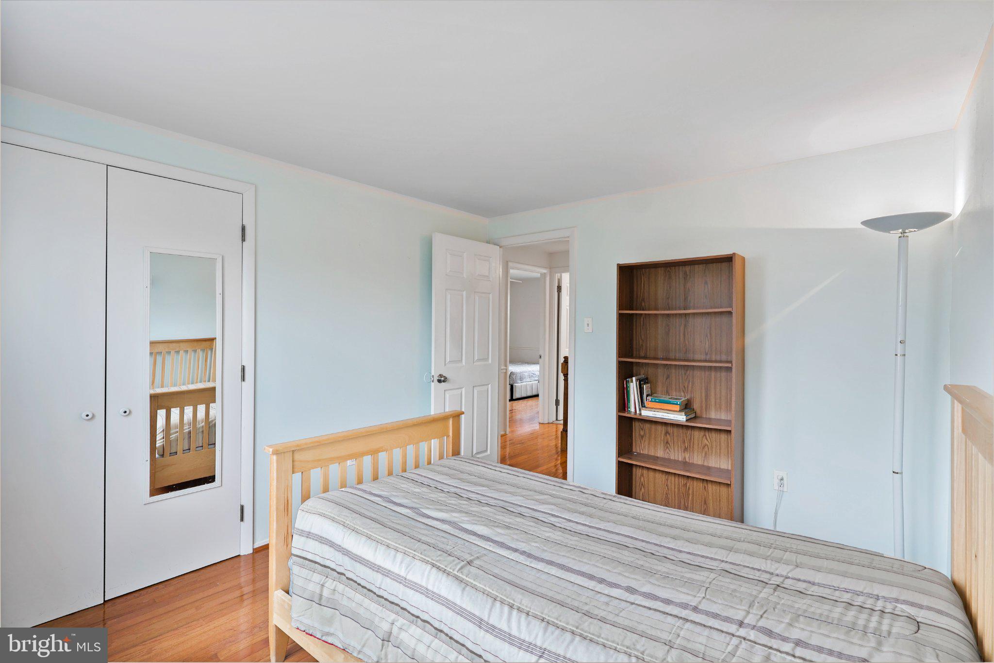 4228 Pageant Lane Fairfax, VA 22033 - Photo 25 of 33 a bedroom with a bed and a closet