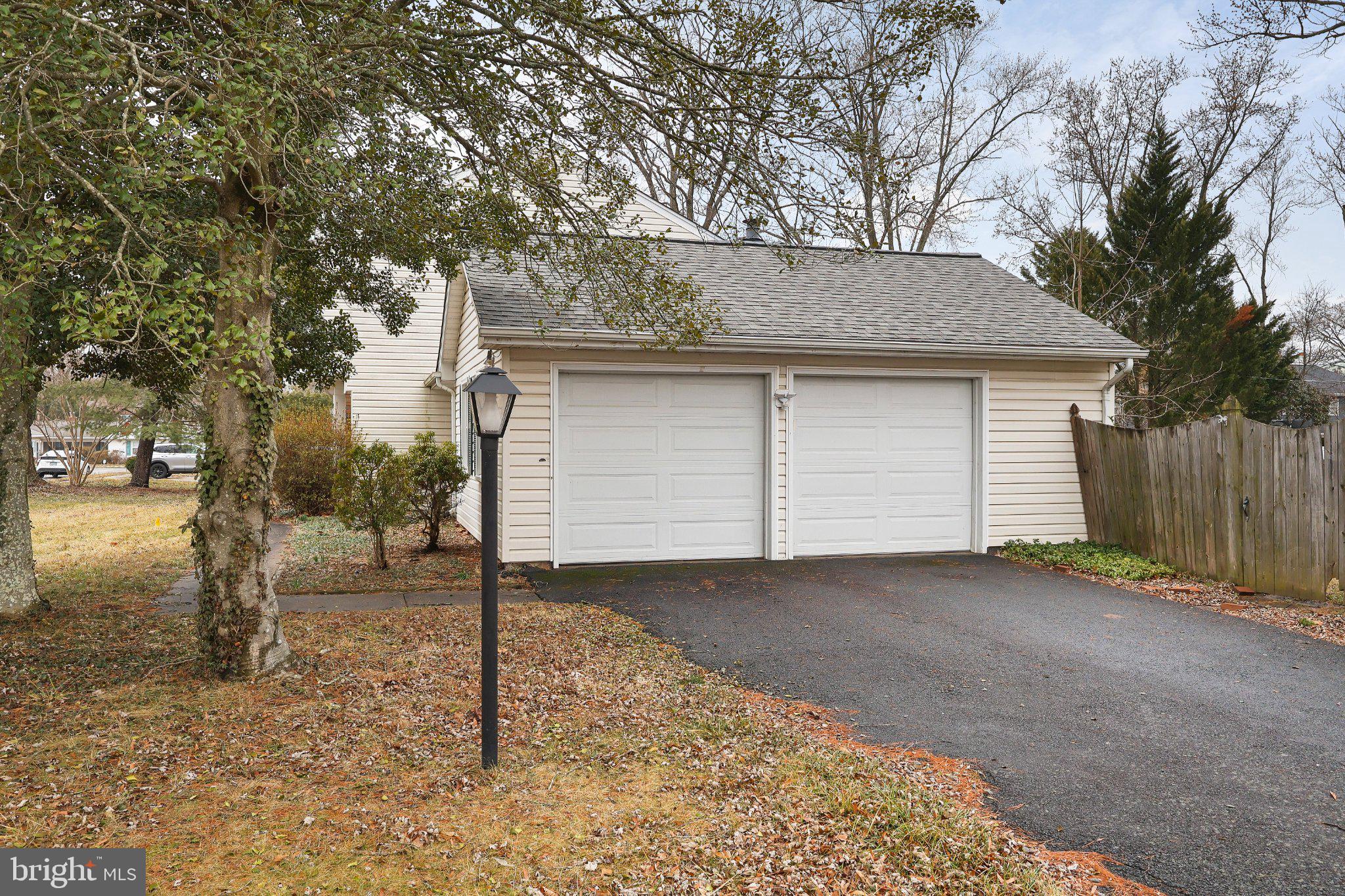 4228 Pageant Lane Fairfax, VA 22033 - Photo 33 of 33 a backyard of a house with a tree