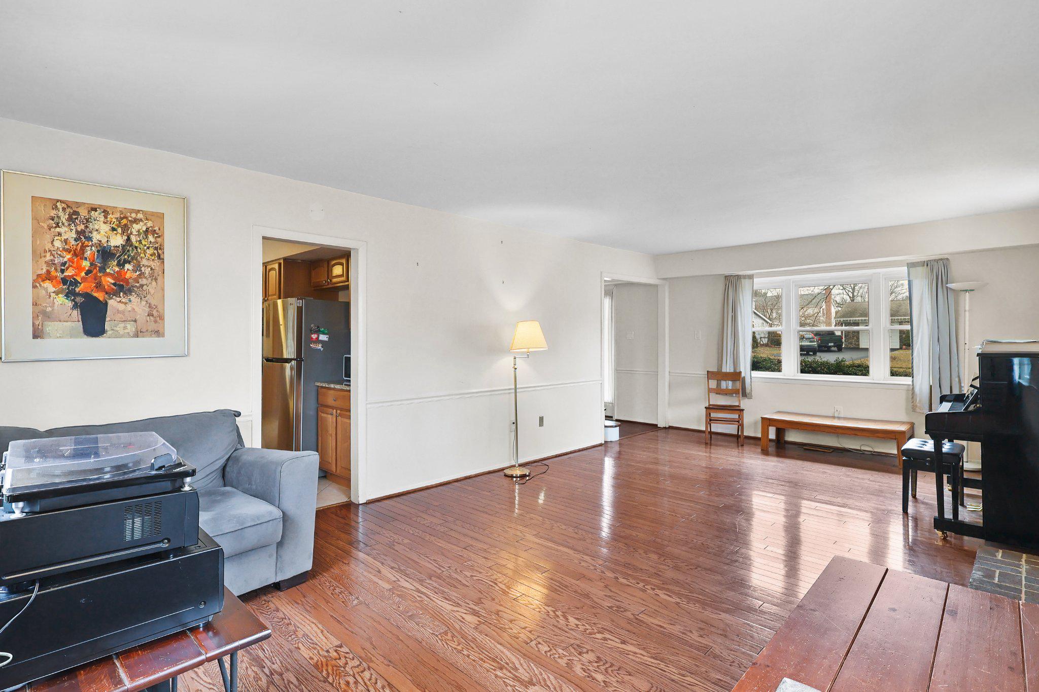4228 Pageant Lane Fairfax, VA 22033 - Photo 4 of 33 a living room with furniture and wooden floor
