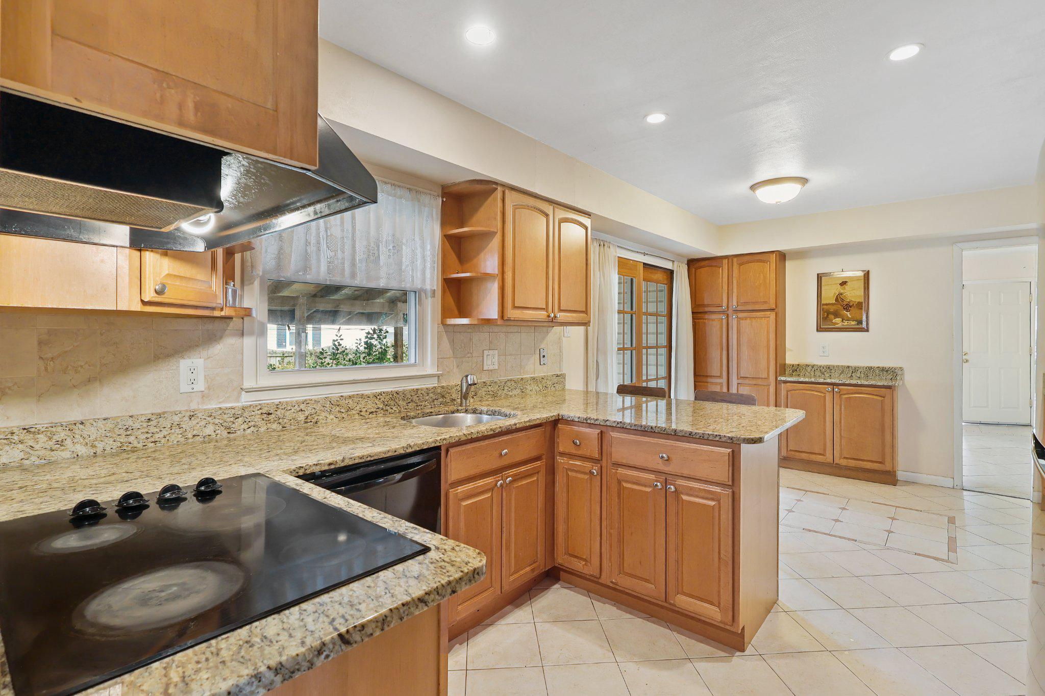 4228 Pageant Lane Fairfax, VA 22033 - Photo 8 of 33 a kitchen with a sink a counter top space and appliances