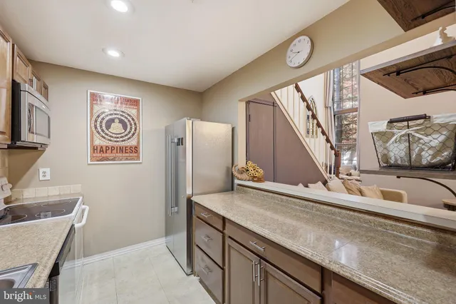 a bathroom with a sink a mirror and a toilet