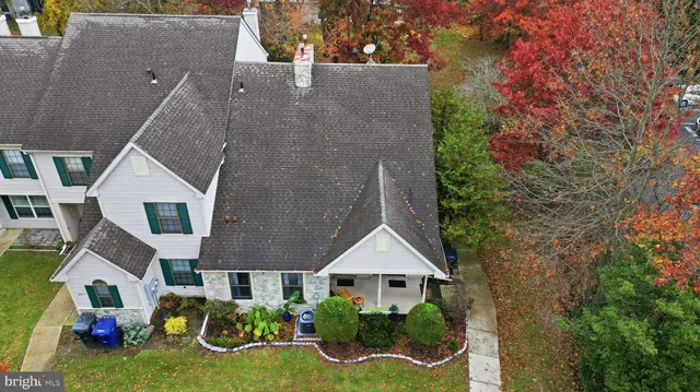 an aerial view of a house with garden