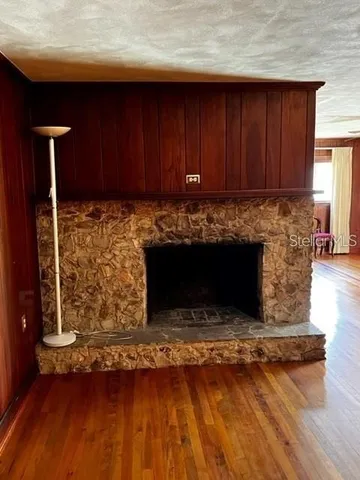 a kitchen with a cabinets and a stove top oven