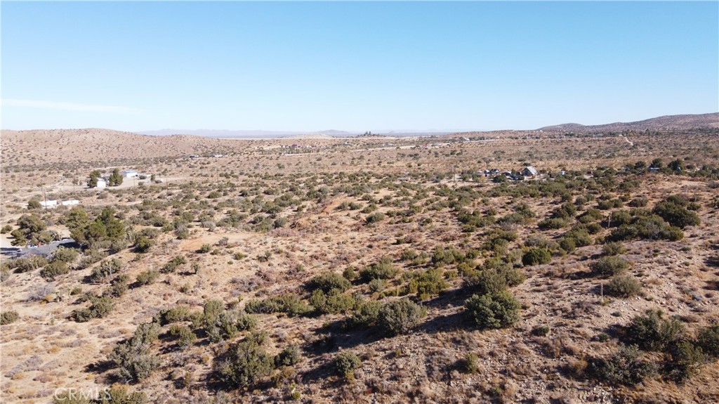 0 Fort Tejon Road Littlerock, CA 93543 - Photo 5 of 11 an aerial view of house with yard and mountain view in back