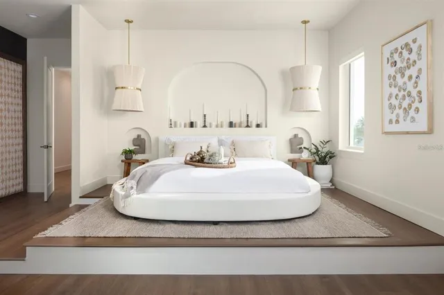 a bathroom with a sink mirror and vanity