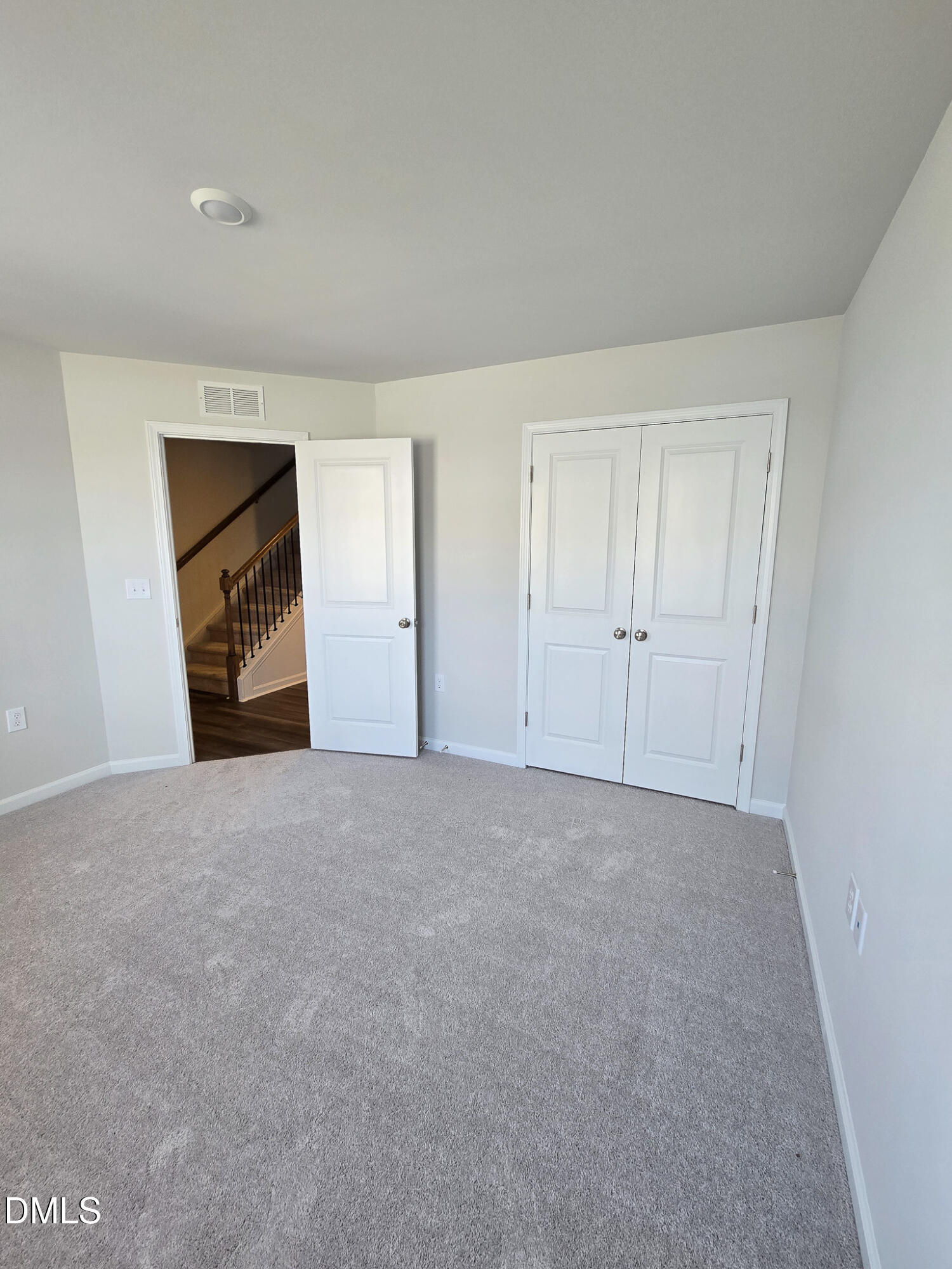 2431 Kasota Lane Raleigh, NC 27610 - Photo 6 of 46 a view of an empty room and closet