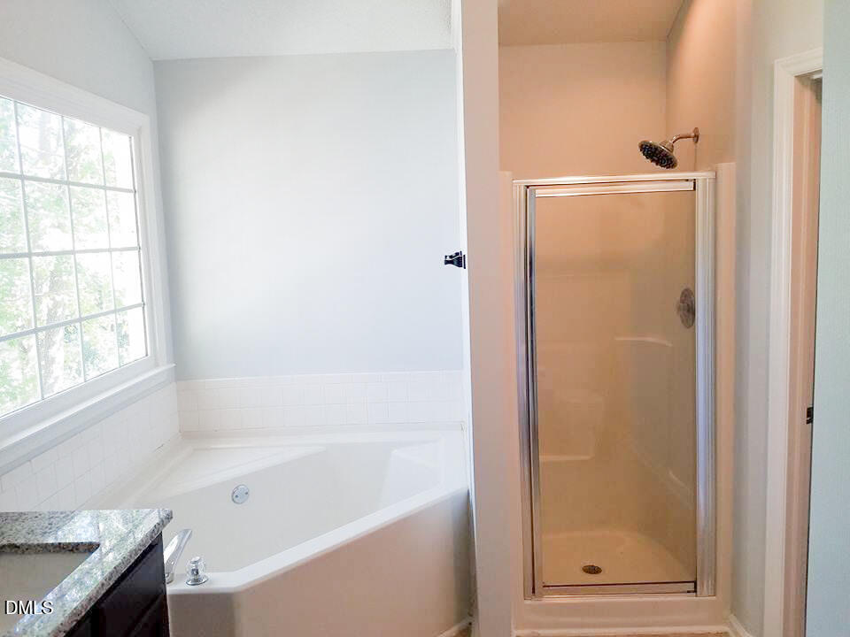 3109 Benton Circle Raleigh, NC 27615 - Photo 18 of 29 Primary soak tub and shower