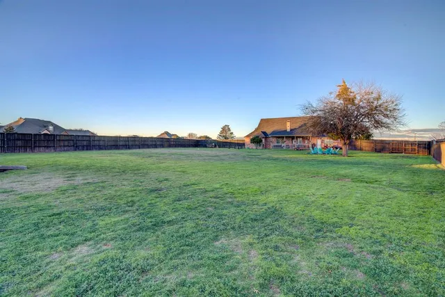 a view of an outdoor space and a yard