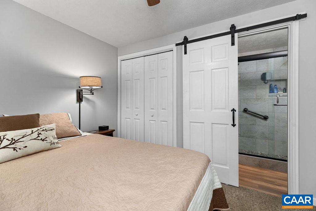 405 3 Ridges Roseland, VA 22967 - Photo 15 of 22 a bedroom with a bed and a shower