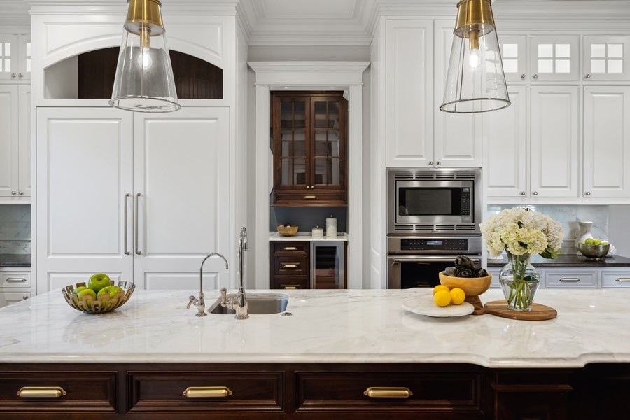 1045 Starr Road Winnetka, IL 60093 - Photo 13 of 57 a kitchen with a sink and a stove
