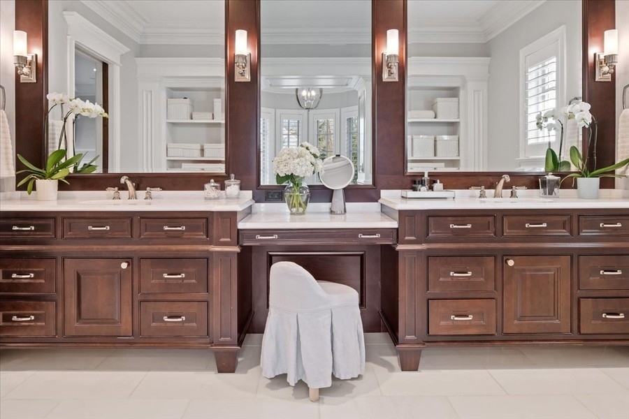1045 Starr Road Winnetka, IL 60093 - Photo 25 of 57 a bathroom with a sink double vanity and a mirror