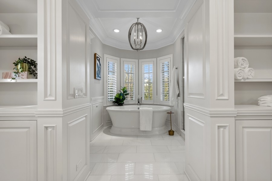 1045 Starr Road Winnetka, IL 60093 - Photo 26 of 57 a large white kitchen with a large window