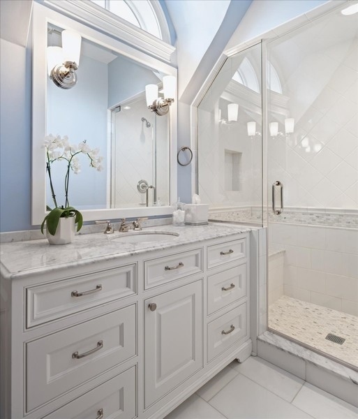 1045 Starr Road Winnetka, IL 60093 - Photo 33 of 57 a bathroom with a granite countertop sink mirror and double