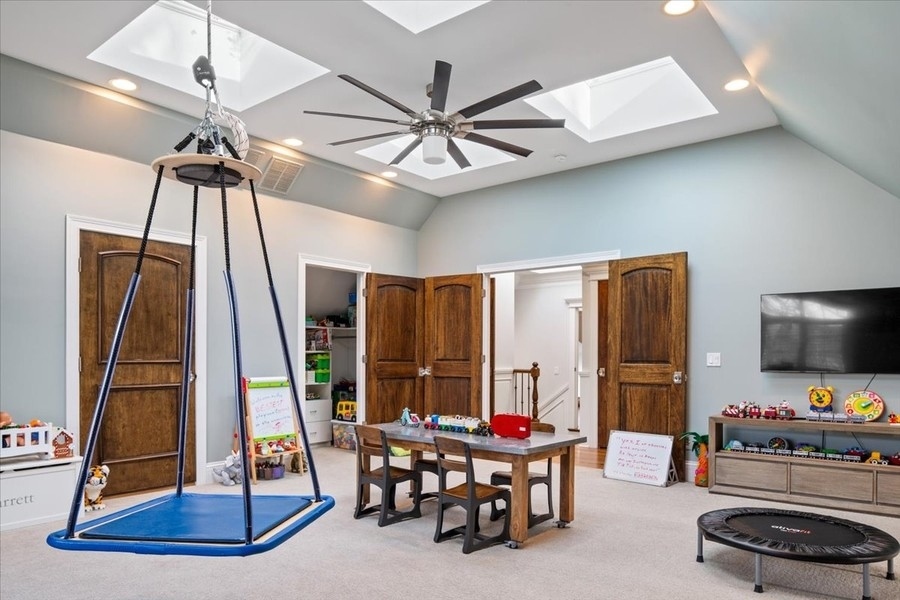 1045 Starr Road Winnetka, IL 60093 - Photo 36 of 57 a dining room with furniture floor to ceiling window and a chandelier