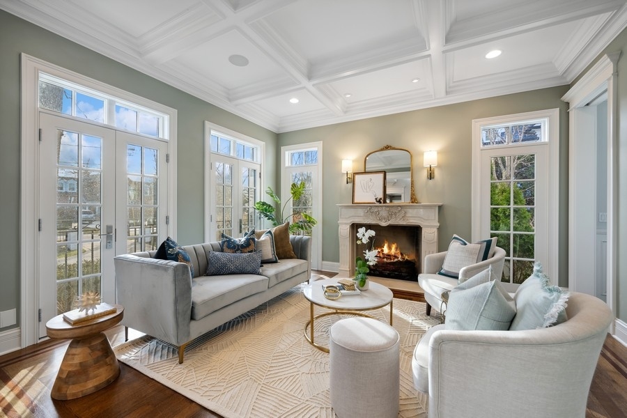 1045 Starr Road Winnetka, IL 60093 - Photo 4 of 57 a living room with furniture and a fireplace