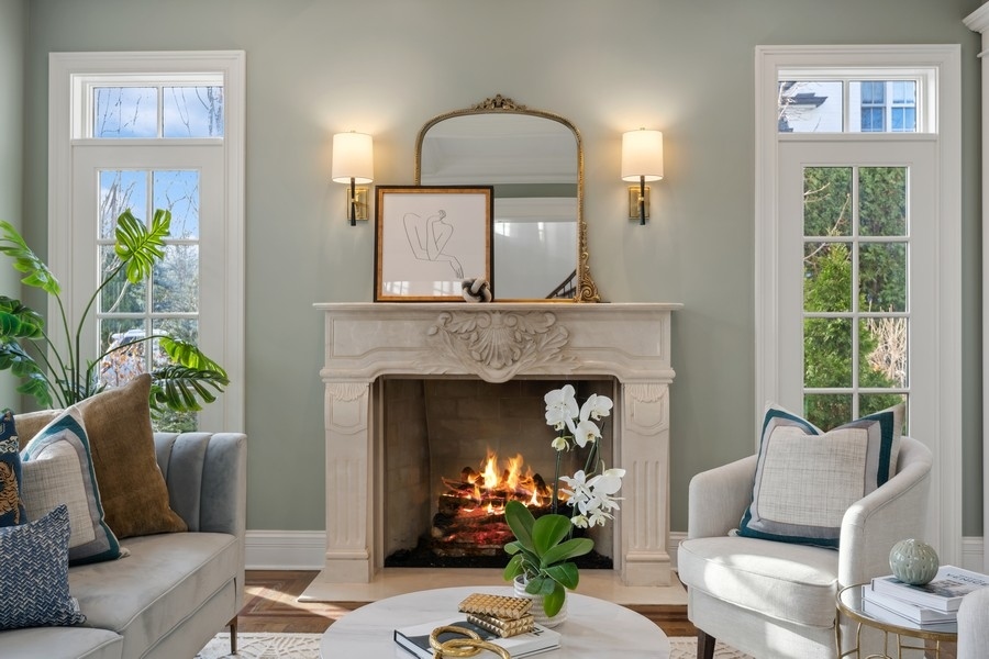 1045 Starr Road Winnetka, IL 60093 - Photo 5 of 57 a living room with furniture and a fireplace