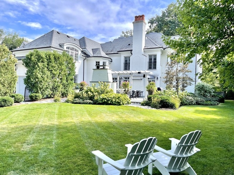 1045 Starr Road Winnetka, IL 60093 - Photo 55 of 57 a view of a chair and table on the garden