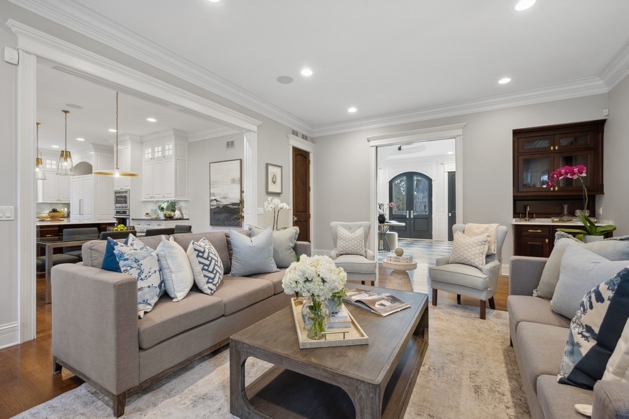 1045 Starr Road Winnetka, IL 60093 - Photo 6 of 57 a living room with furniture and a dining table
