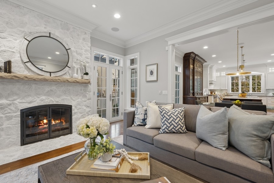1045 Starr Road Winnetka, IL 60093 - Photo 8 of 57 a living room with furniture a fireplace a rug and a fireplace