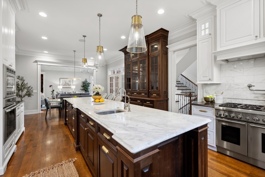 1045 Starr Road Winnetka, IL 60093 - Photo 10 of 57 a kitchen with stove and refrigerator