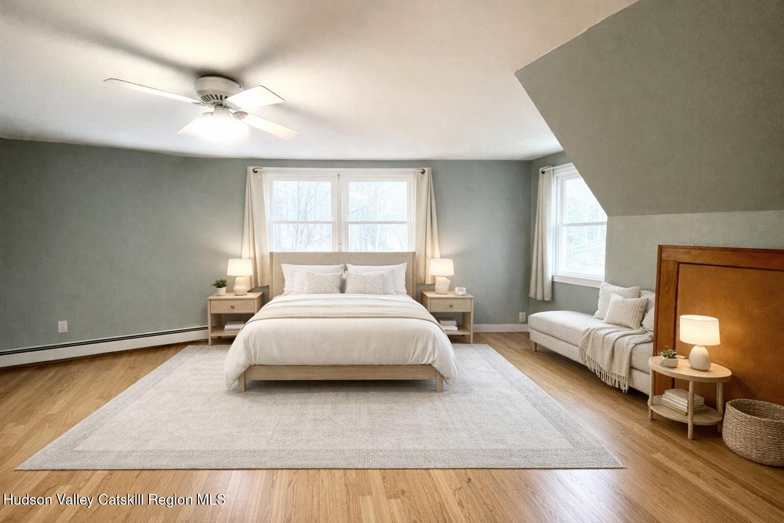 265 Scribner Hollow Road Hunter, NY 12442 - Photo 21 of 26 a bedroom with a bed and window