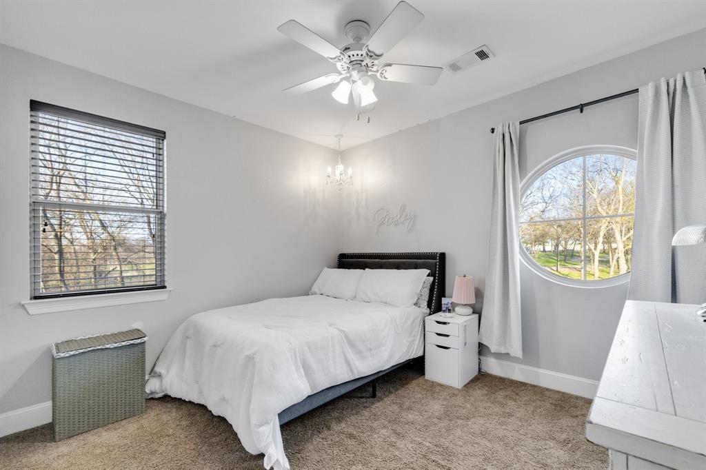 689 Jim Cannon Road Van Alstyne, TX 75495 - Photo 22 of 35 Bedroom with light colored carpet and ceiling fan