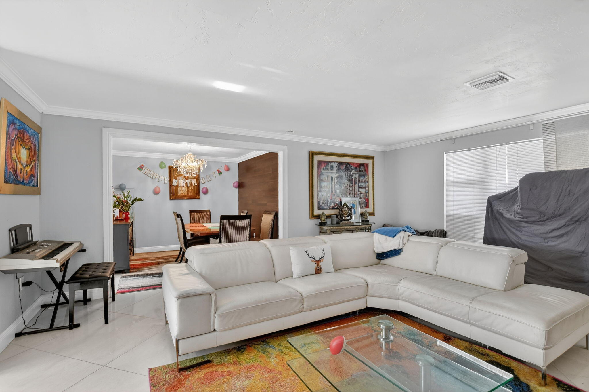 256 Southwest 11th Place Boca Raton, FL 33432 - Photo 12 of 43 a living room with furniture or couch and a window