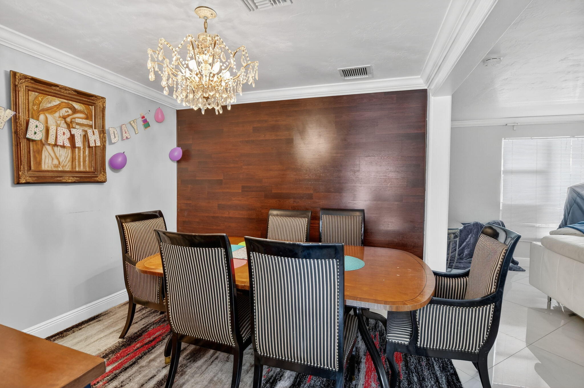 256 Southwest 11th Place Boca Raton, FL 33432 - Photo 14 of 43 a view of a dining room with furniture and chandelier