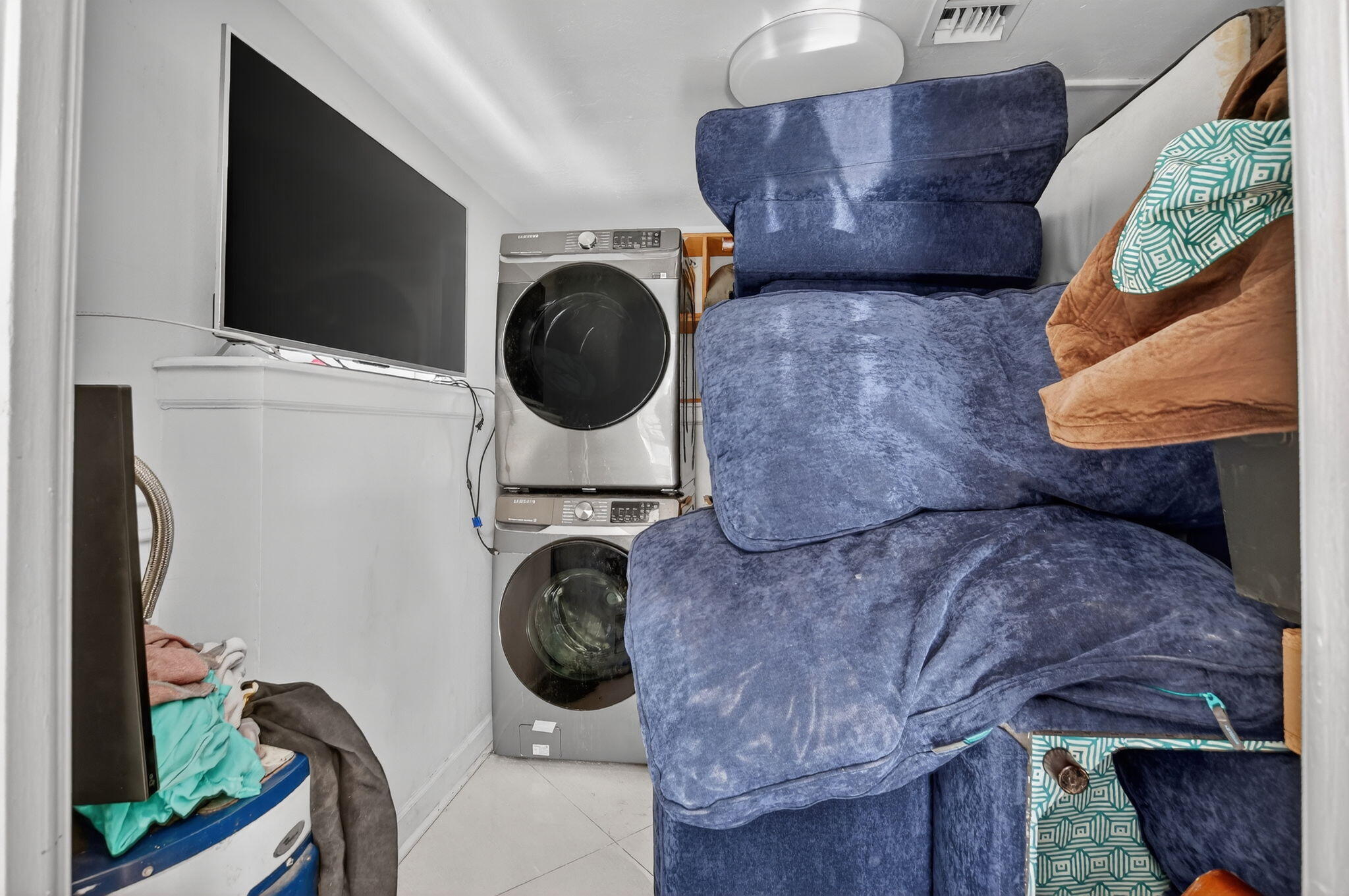 256 Southwest 11th Place Boca Raton, FL 33432 - Photo 22 of 43 a living room with furniture and a flat screen tv