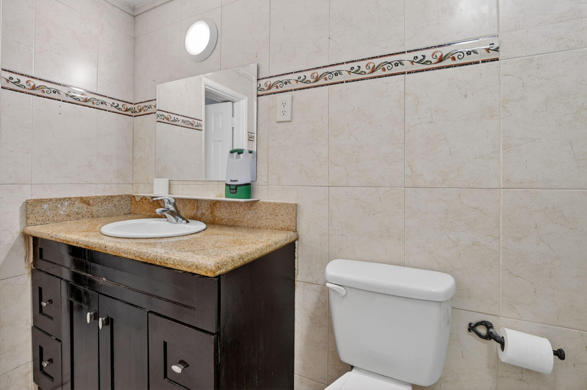 256 Southwest 11th Place Boca Raton, FL 33432 - Photo 32 of 43 a bathroom with a sink and a toilet