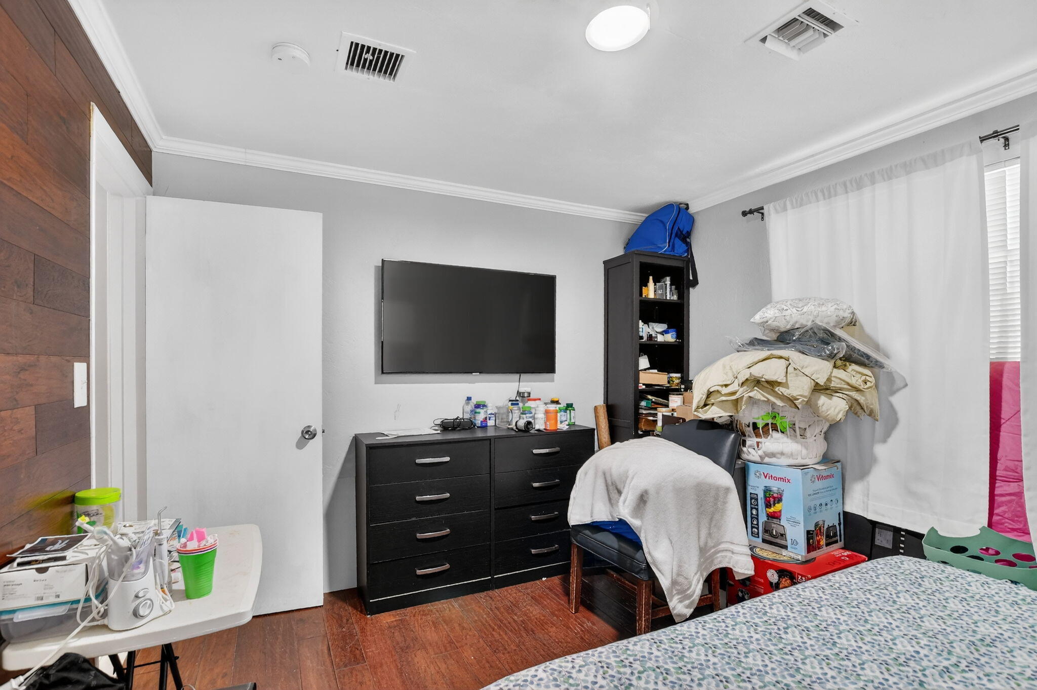 256 Southwest 11th Place Boca Raton, FL 33432 - Photo 35 of 43 a living room with furniture and a flat screen tv