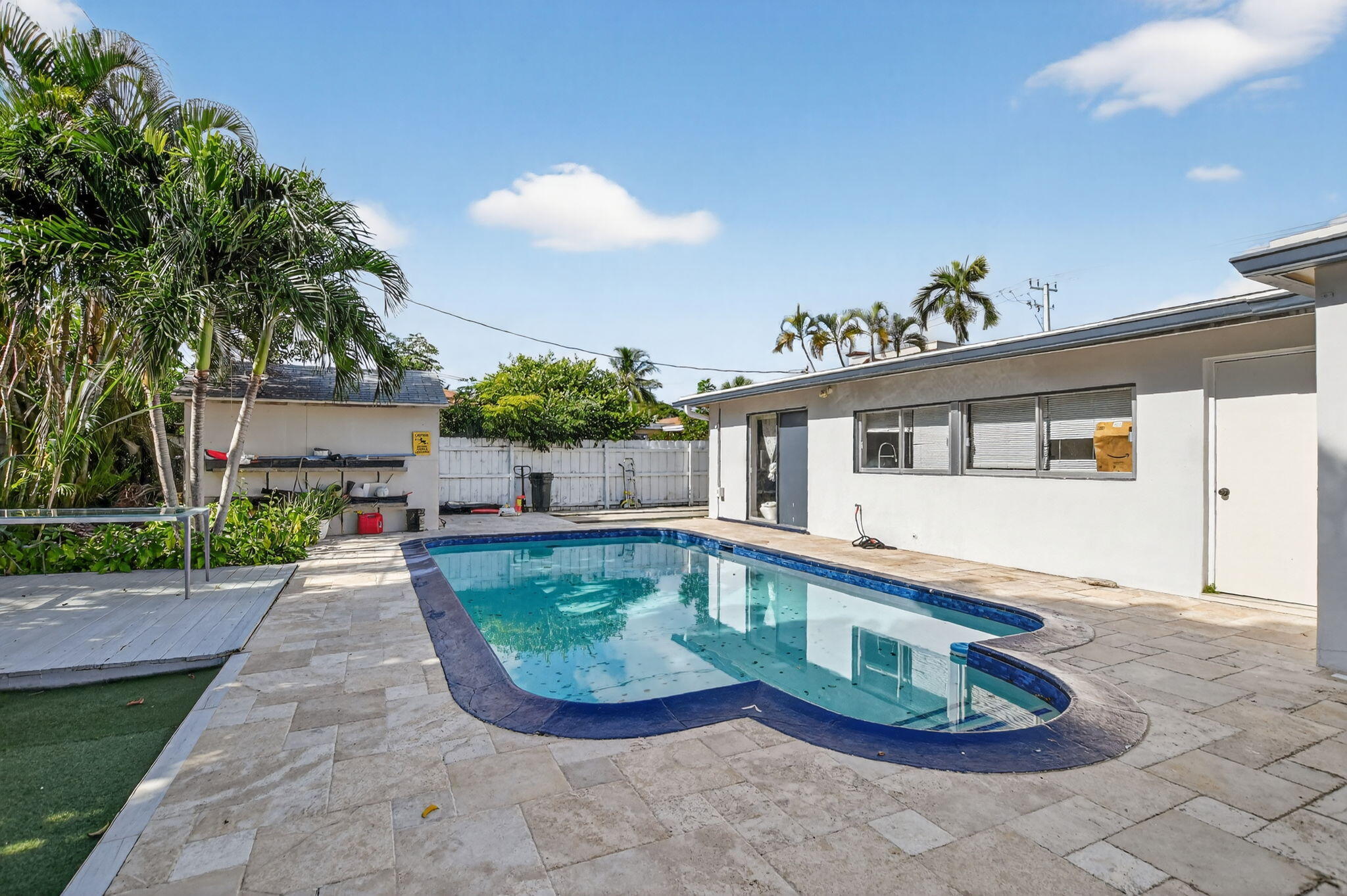 256 Southwest 11th Place Boca Raton, FL 33432 - Photo 37 of 43 a view of a house with a yard