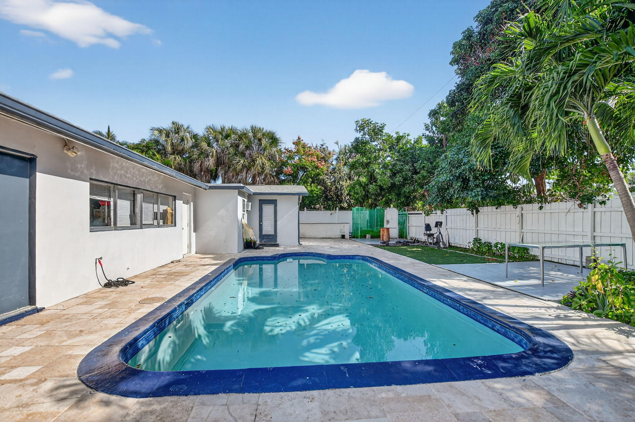 256 Southwest 11th Place Boca Raton, FL 33432 - Photo 40 of 43 a view of a house with swimming pool