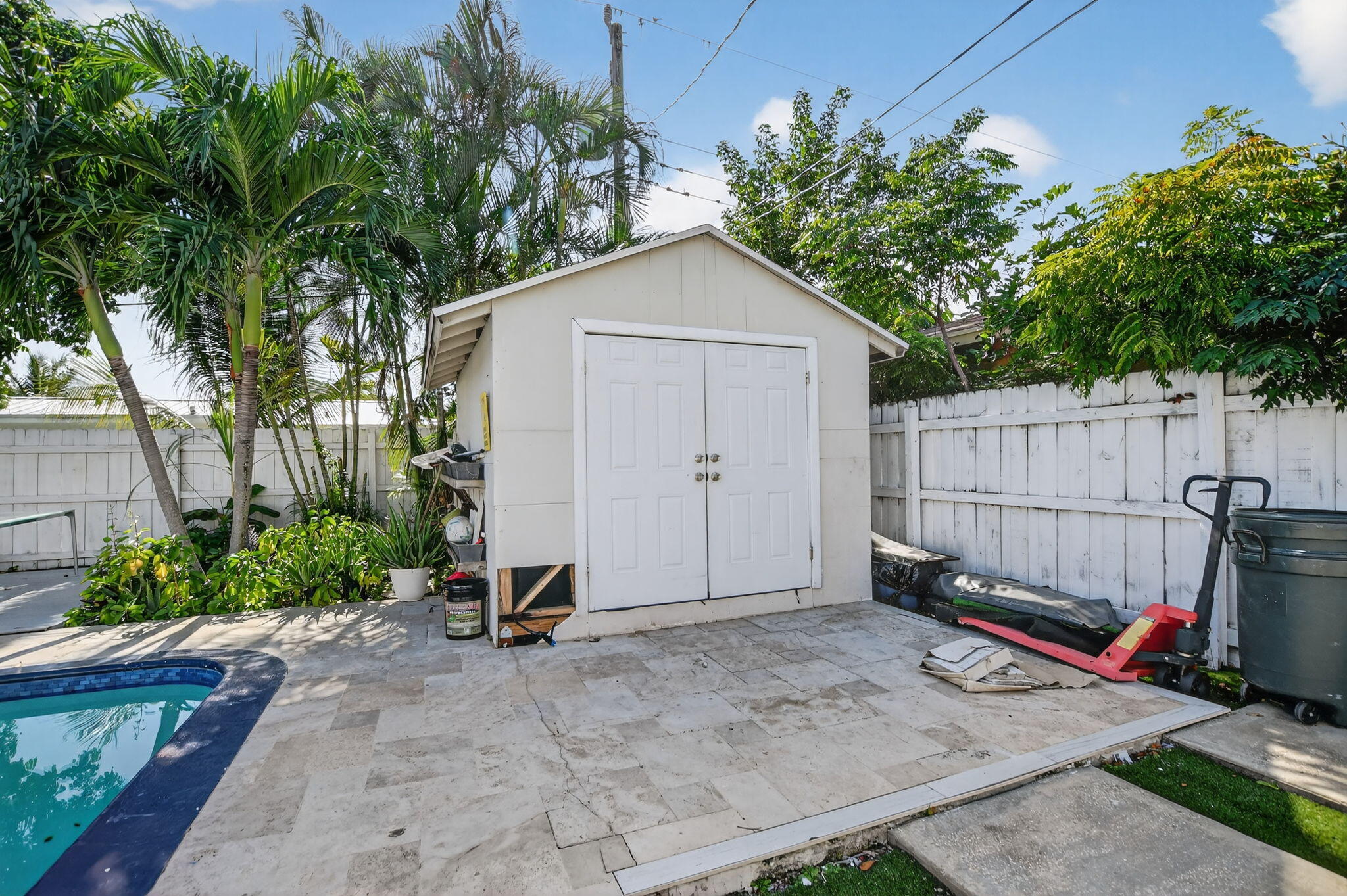 256 Southwest 11th Place Boca Raton, FL 33432 - Photo 42 of 43 a view of backyard with a barn and a large cactus tree