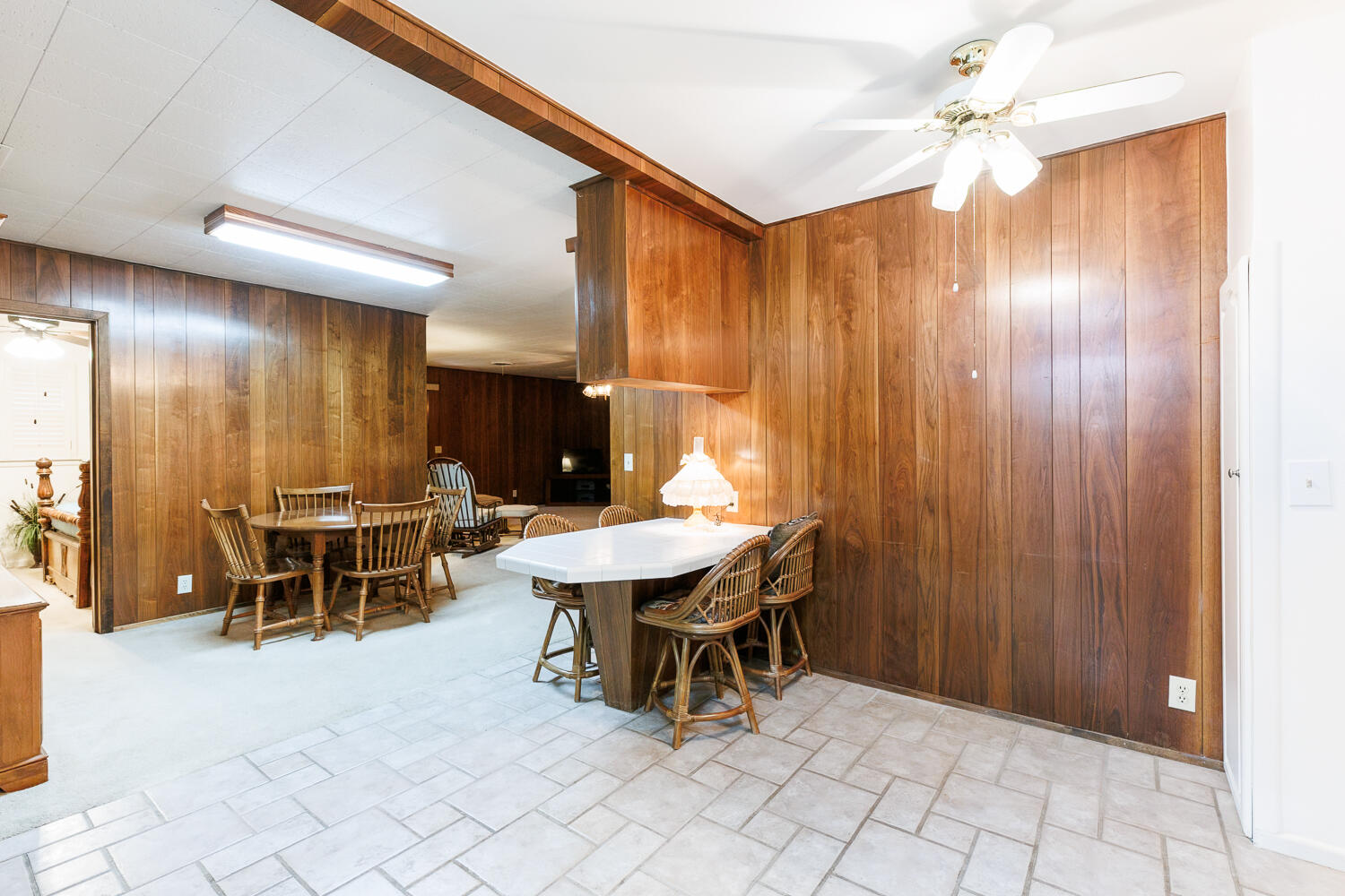 850 South 10th Street Slaton, TX 79364 - Photo 14 of 57 a dining room with furniture and chandelier