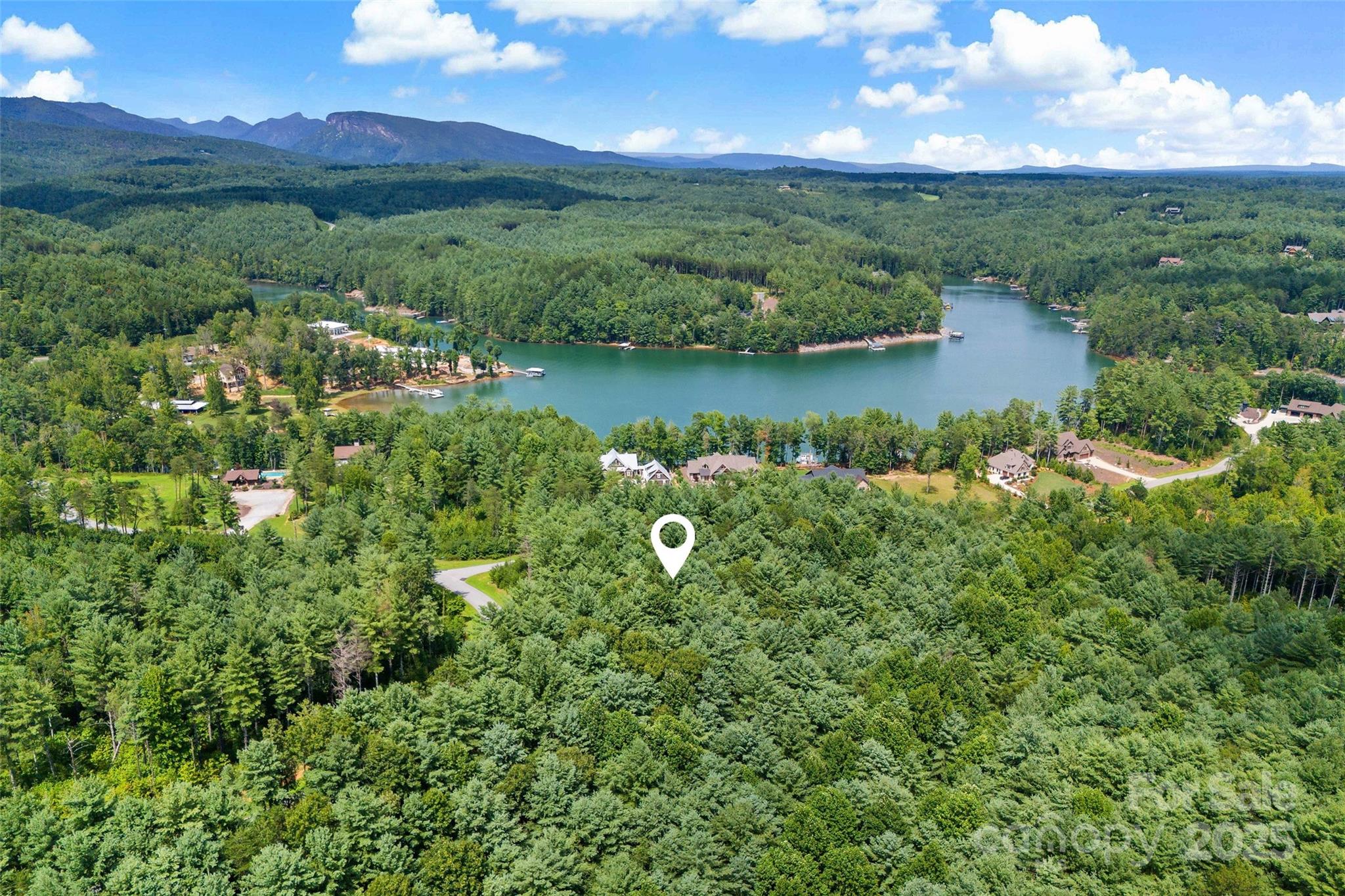 365 Peninsula Reserve Road, Unit 25 Nebo, NC 28761 - Photo 11 of 47 an aerial view of lake residential house with outdoor space and trees all around