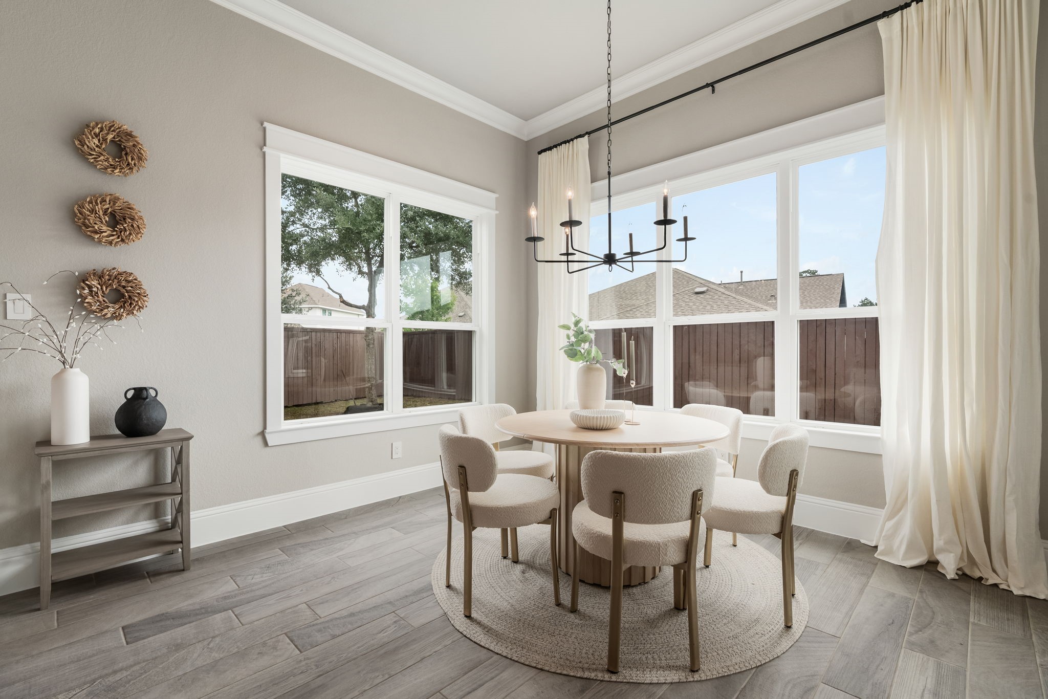 2206 Rope Maker Road Conroe, TX 77384 - Photo 27 of 42 Sunny eat-in kitchen surrounded by windows creates the perfect everyday dining space.