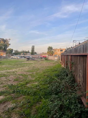 a view of a city with an ocean view