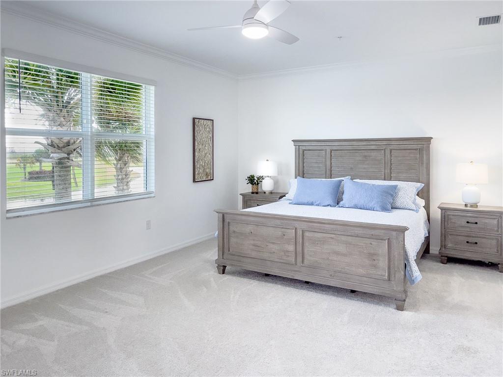 6012 Ellerston Way Avenue, Unit 1121 Immokalee, FL 34142 - Photo 13 of 50 a bedroom with a bed and a dresser