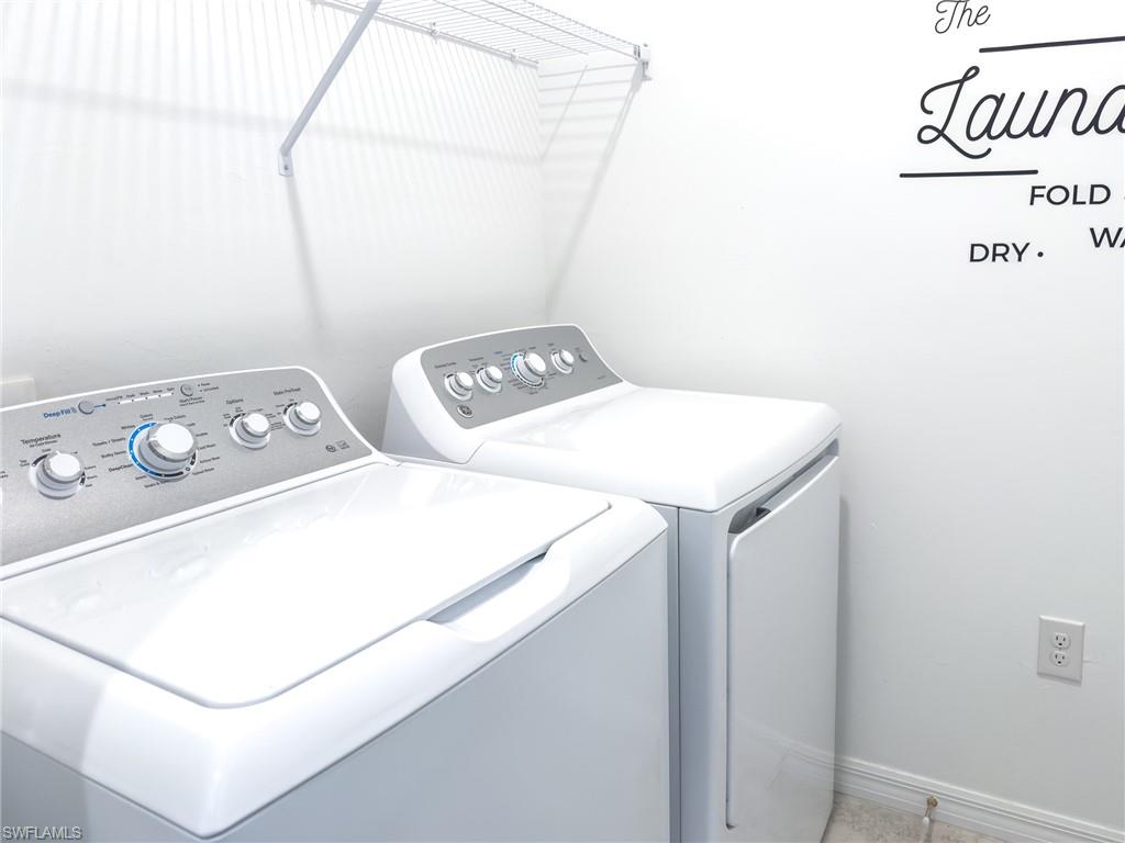 6012 Ellerston Way Avenue, Unit 1121 Immokalee, FL 34142 - Photo 23 of 50 a utility room with dryer and washer
