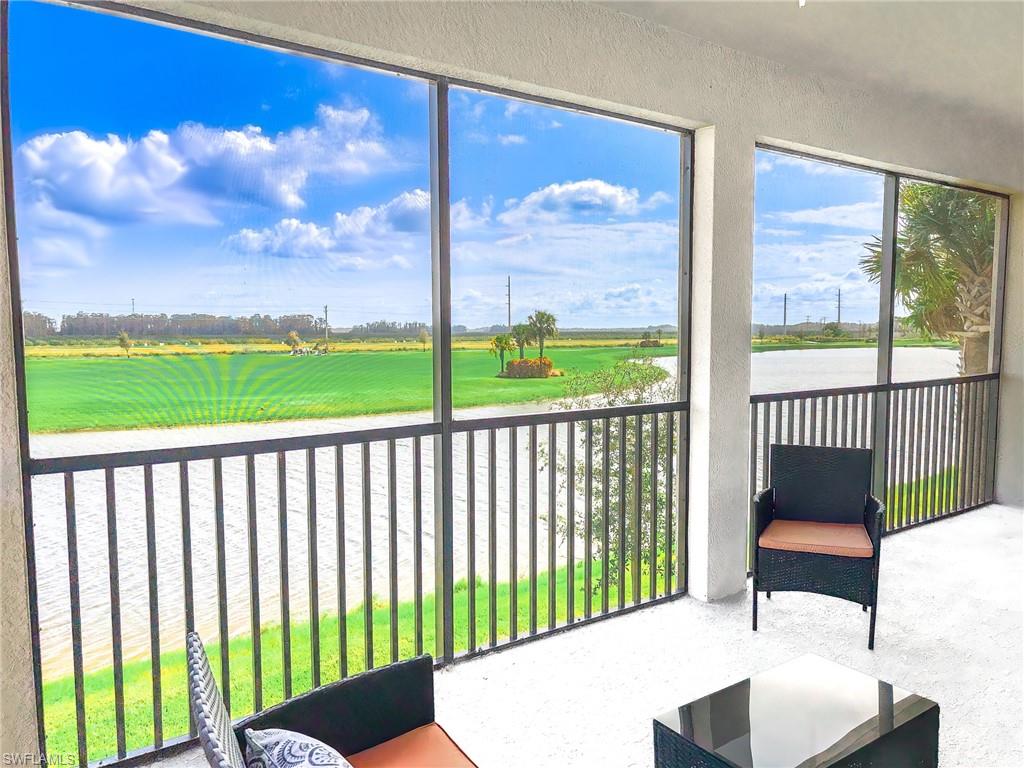 6012 Ellerston Way Avenue, Unit 1121 Immokalee, FL 34142 - Photo 24 of 50 a balcony view with a garden space