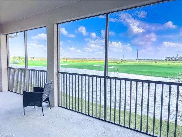 a view of a park with a palm trees
